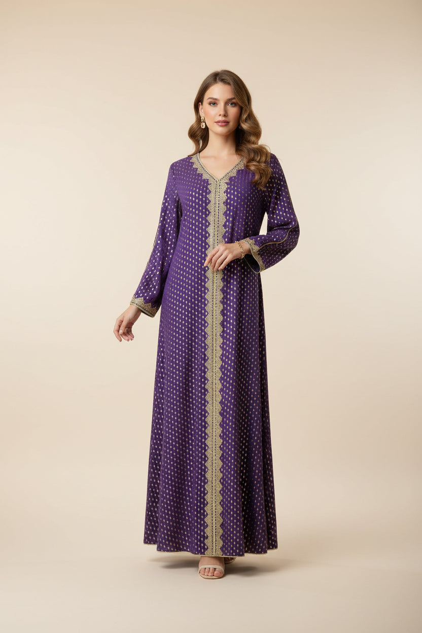 Purple dress with gold embroidery on a mannequin against a white paneled wall.