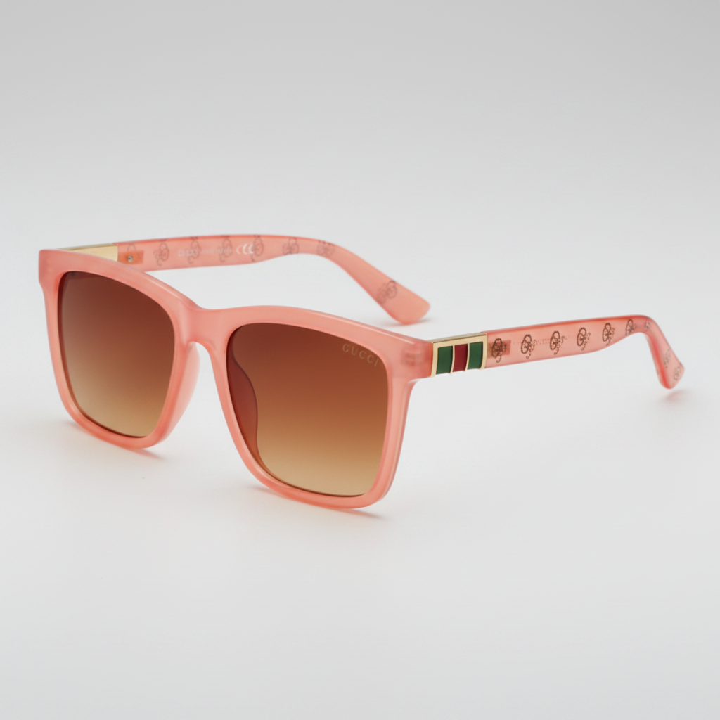 Pink Gucci sunglasses with a brown case on a white background