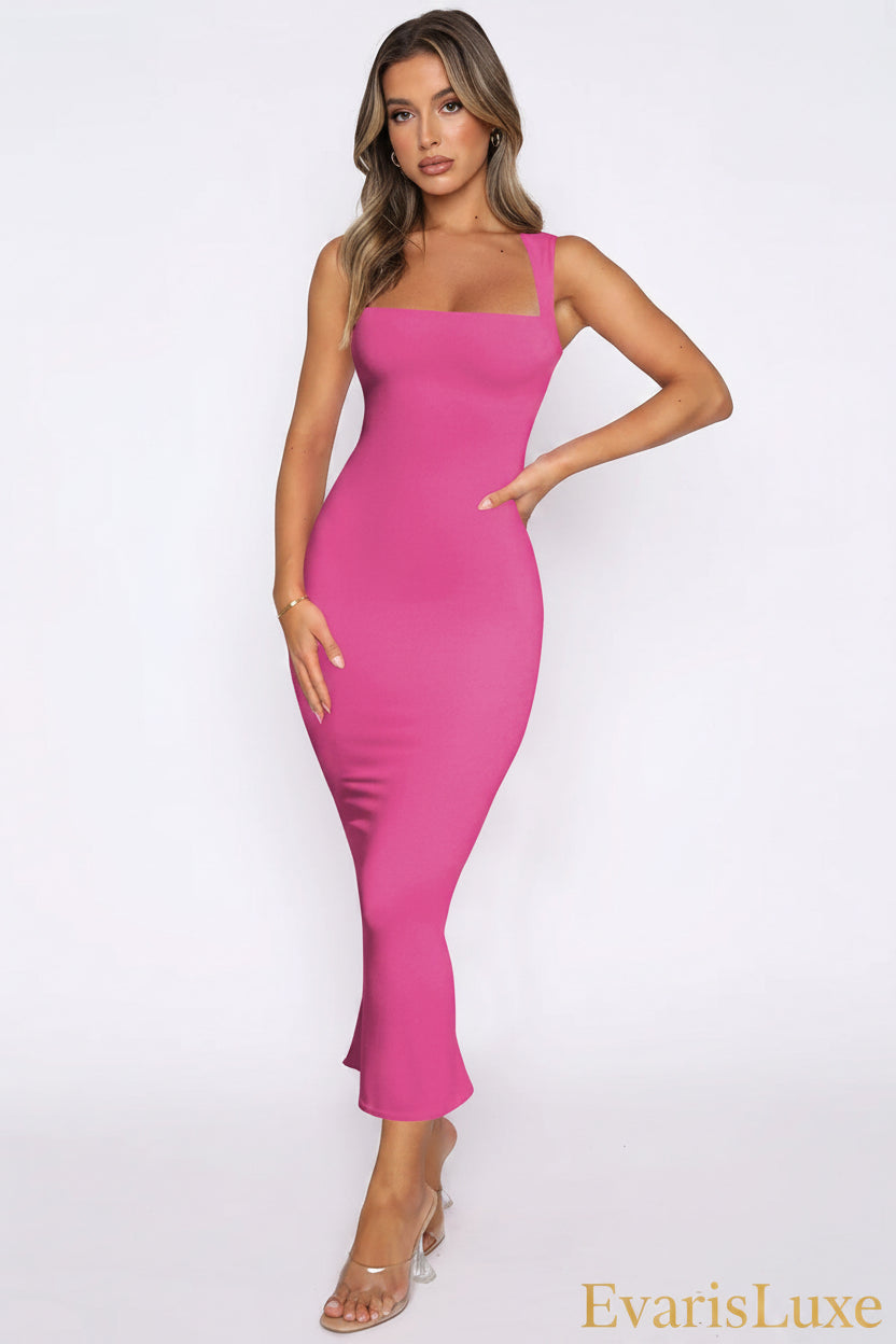 Woman wearing a pink dress on a white background