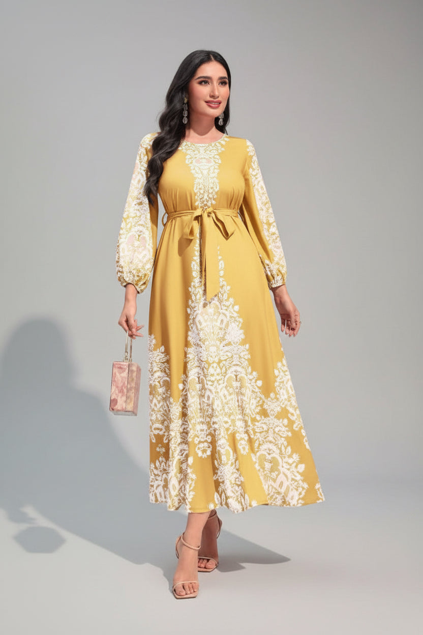 Woman in a yellow dress with white lace details standing in front of a blue door and white wall.
