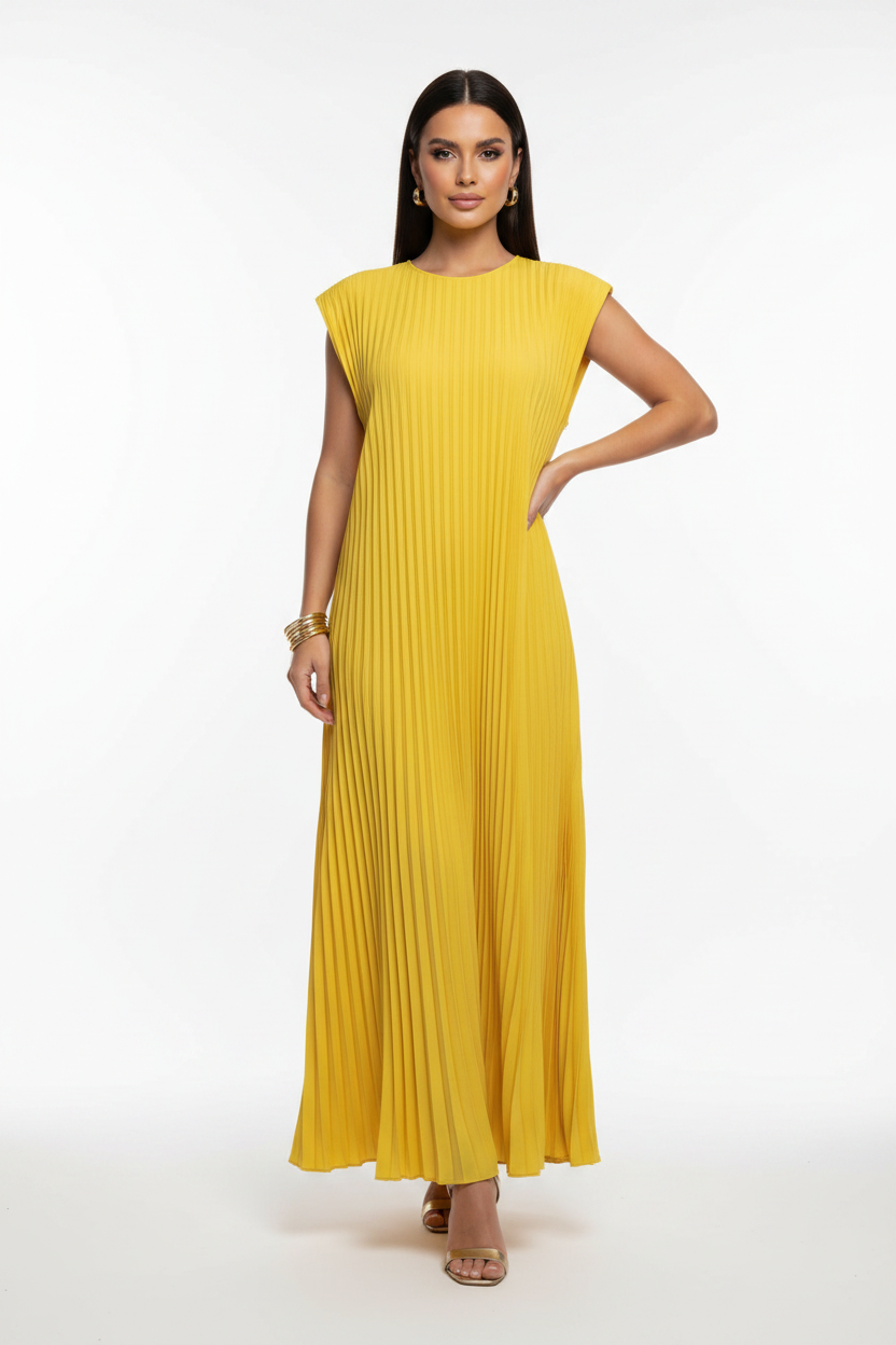 Person wearing a yellow dress in a room with decor elements.