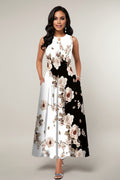Woman wearing a floral dress with a black and white pattern on a gray background