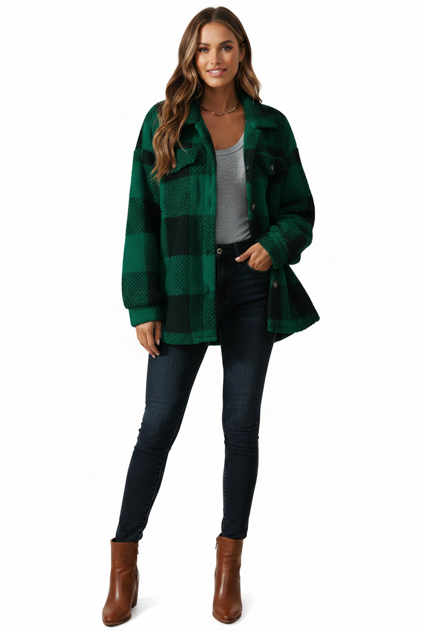 Green plaid coat worn by a person on a white background