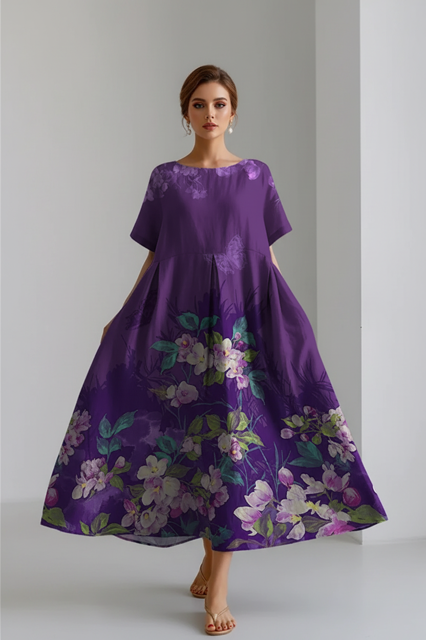 Purple floral dress on a plain background