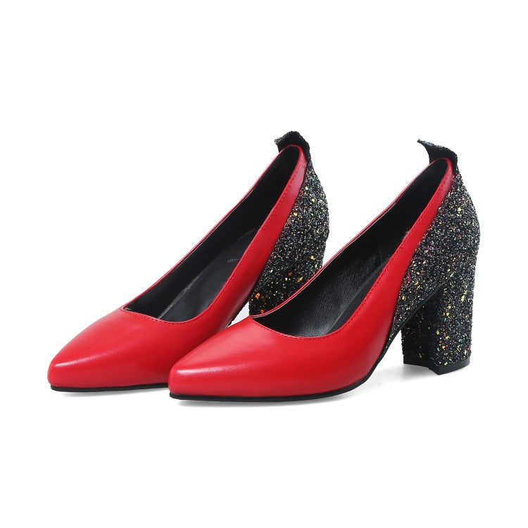 Red high-heeled shoes with glittery black block heels on a white background