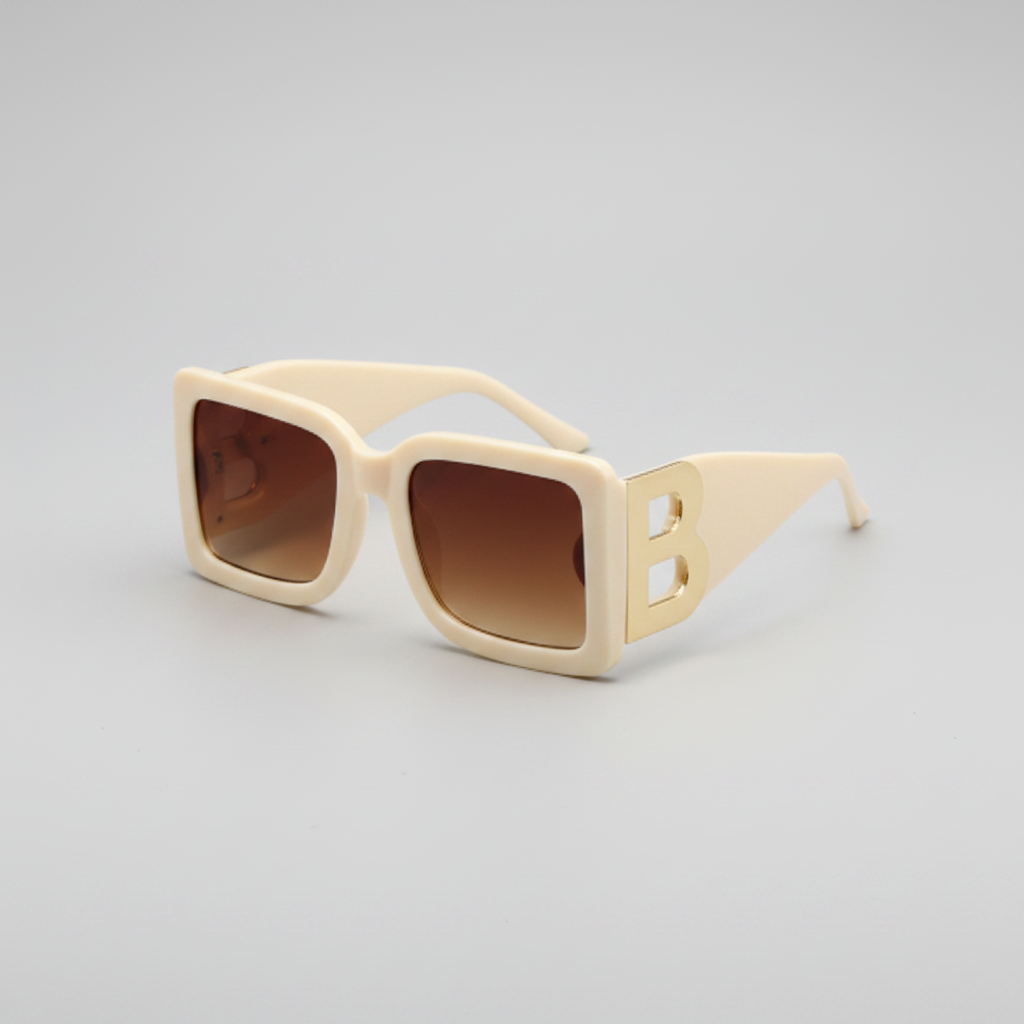 Beige sunglasses with brown lenses on a white background