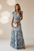 Woman wearing a floral dress on a white background