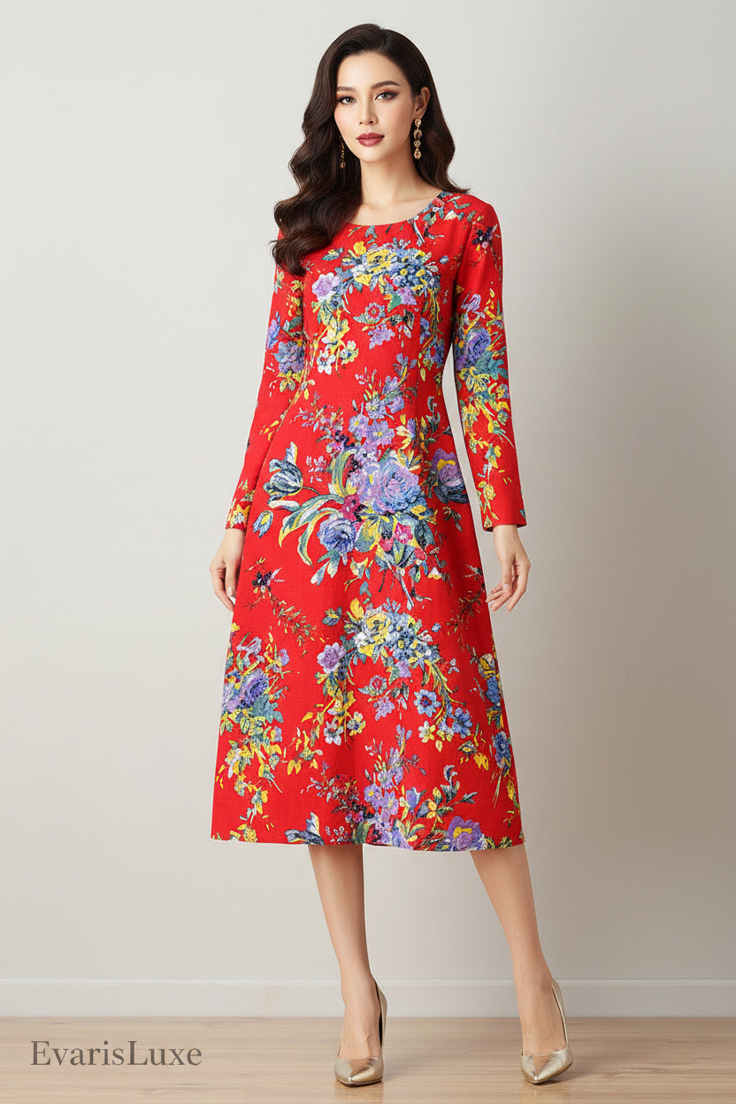 Woman wearing a red floral dress against a plain background