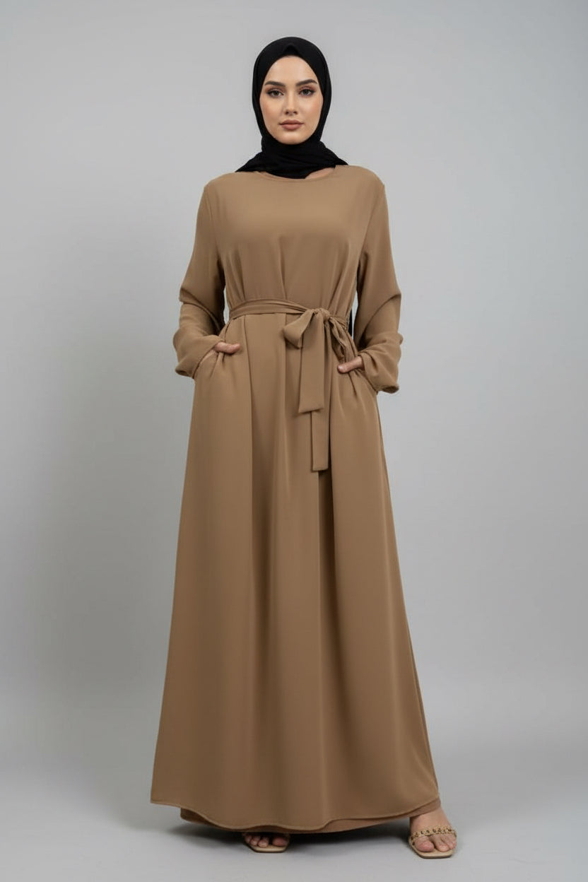 Brown long dress with a belt on a white background