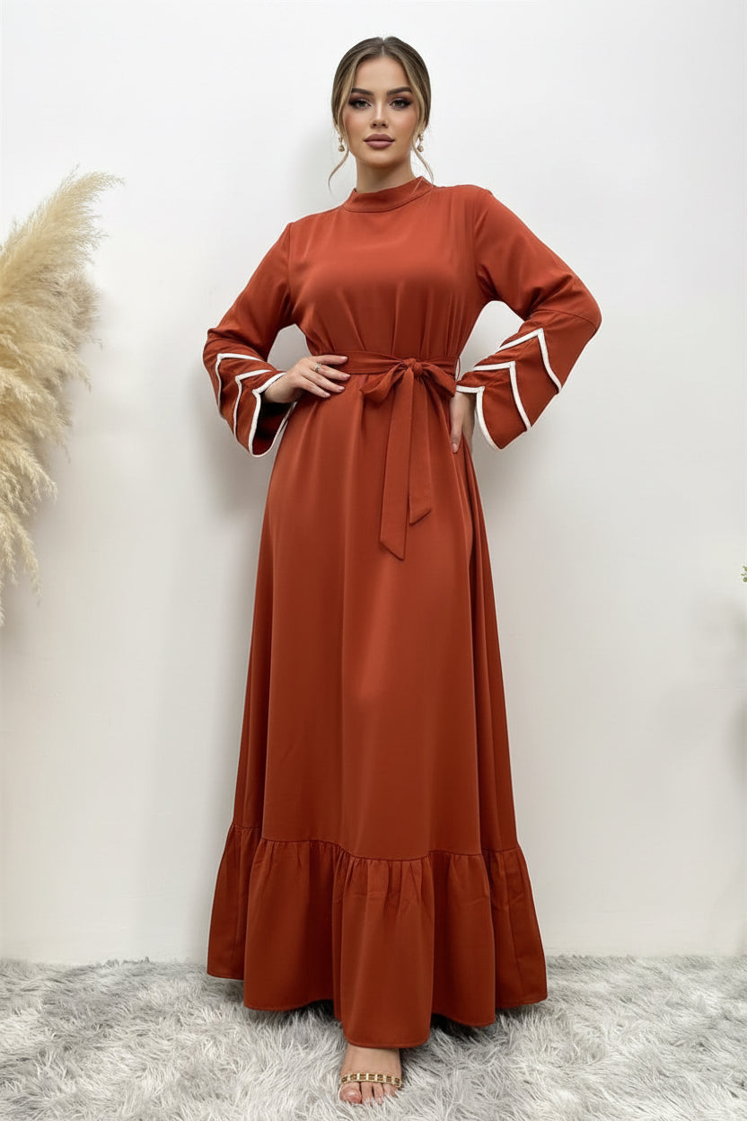 Brown dress with white trim on a white background