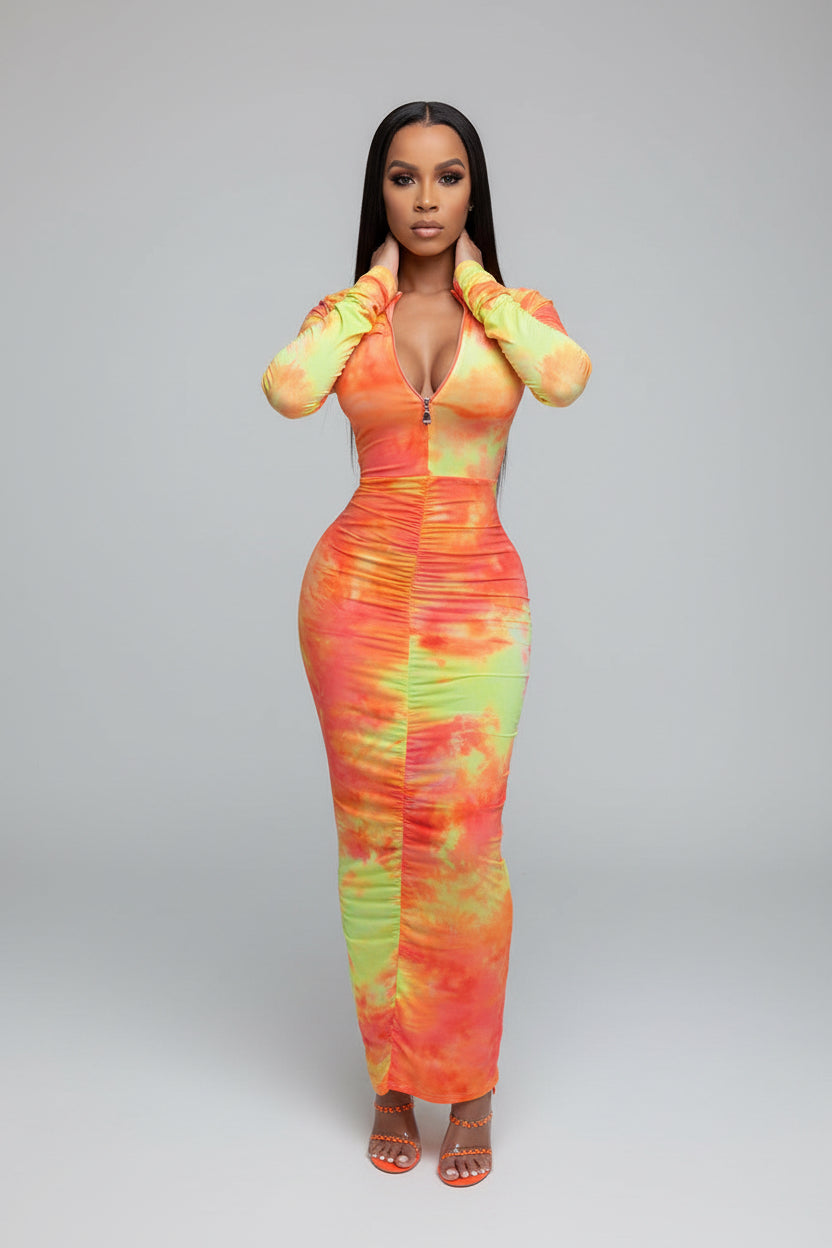 Person wearing a colorful dress in a modern kitchen