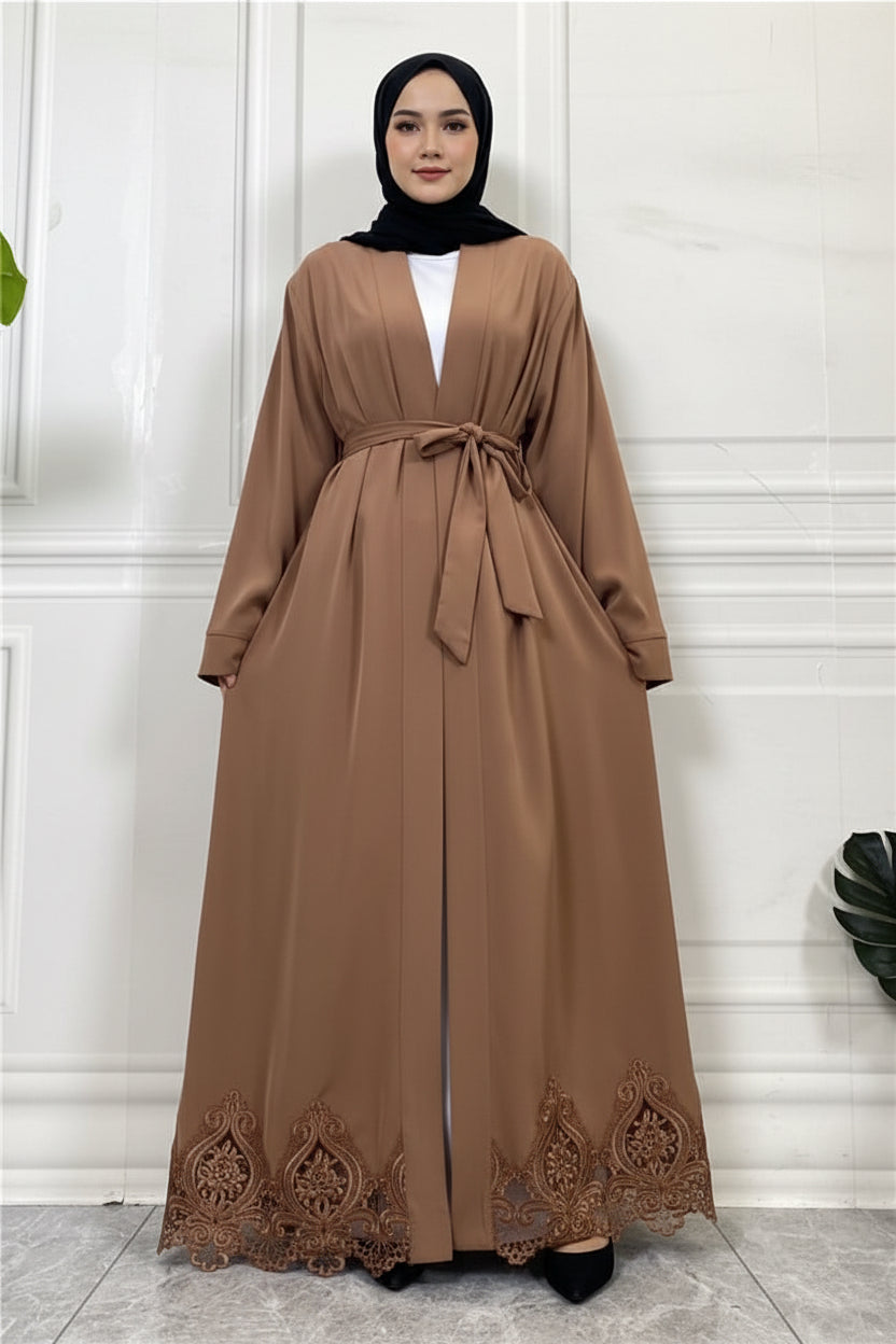 Brown abaya with lace details on a white background