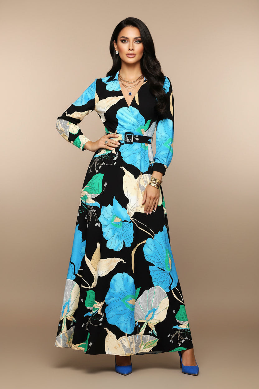 Woman wearing a black floral dress with blue and green flowers on a white background