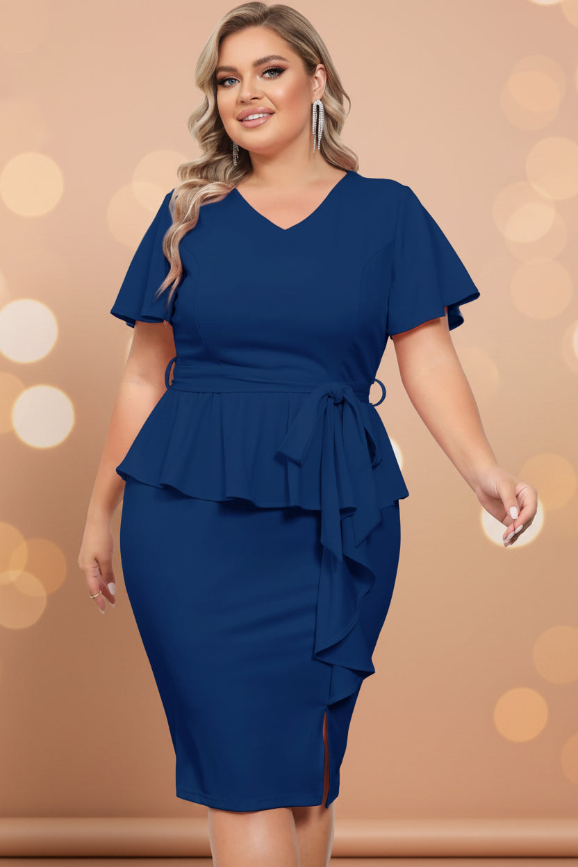 Woman wearing a blue dress with ruffled layers on a white background