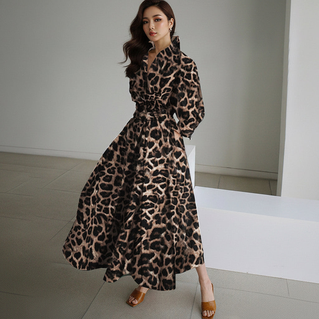 Woman wearing a leopard print dress in an indoor setting