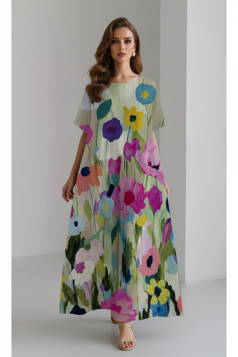 Woman wearing a colorful floral dress on a white background