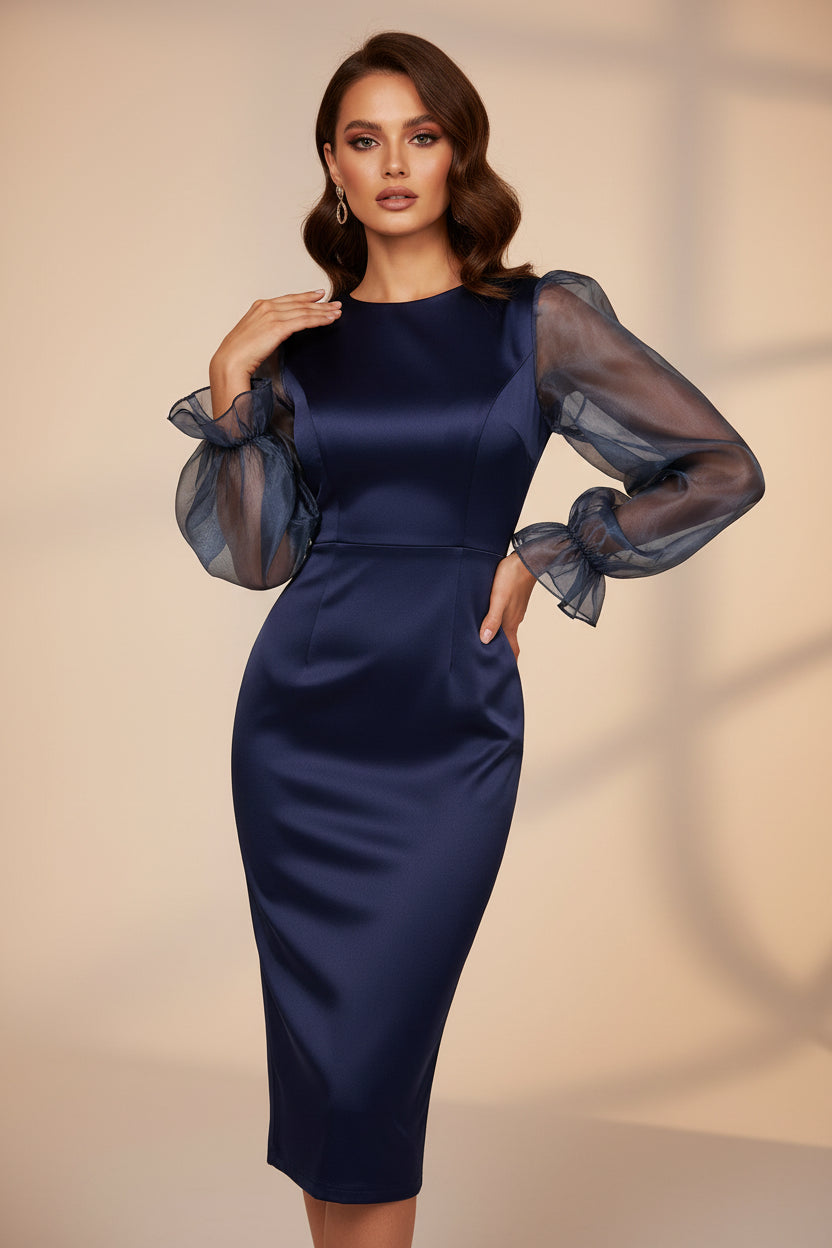 Navy blue dress with sheer long sleeves on a white background