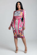 Woman wearing a colorful dress with abstract patterns on a white background