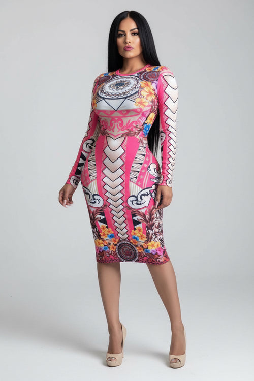 Woman wearing a colorful dress with abstract patterns on a white background