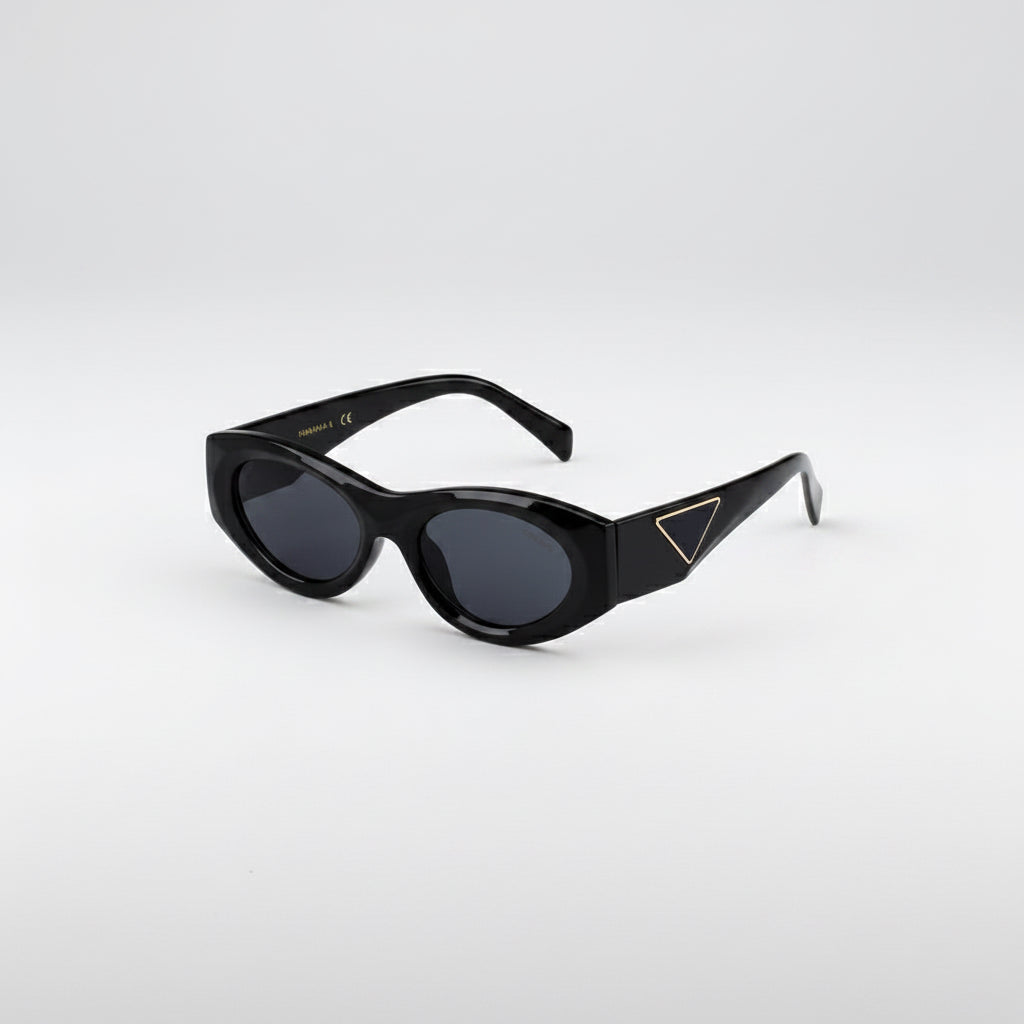 Black sunglasses with a triangle design on a light gray background