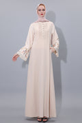 Beige abaya with floral cuffs on a white background