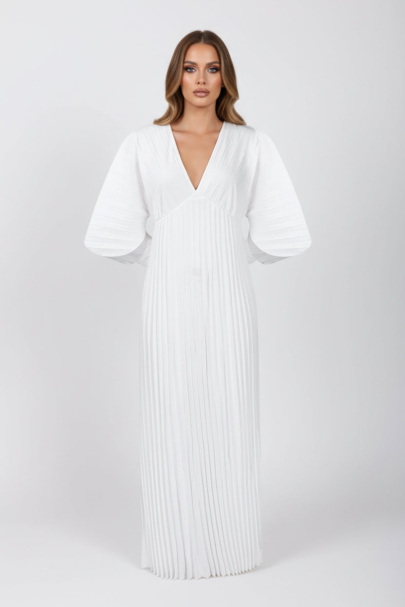 White pleated dress on a white background