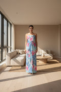 Floral strapless dress with pink and blue flowers on a white background
