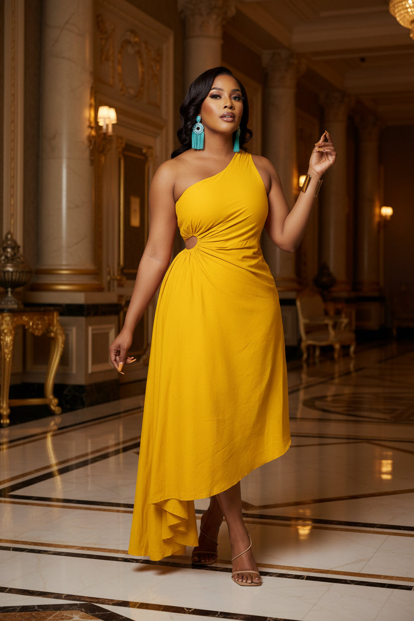 Woman wearing a yellow one-shoulder dress on a white background
