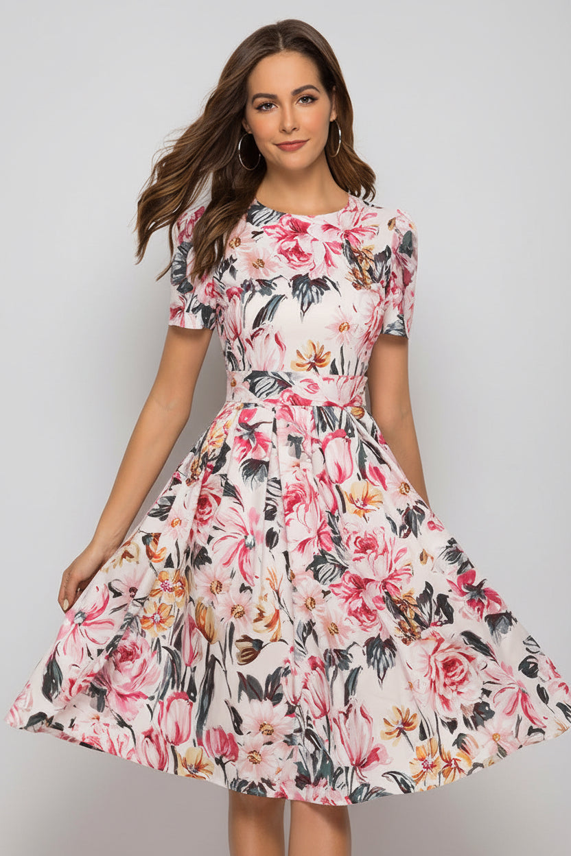 Woman wearing a floral dress on a white background