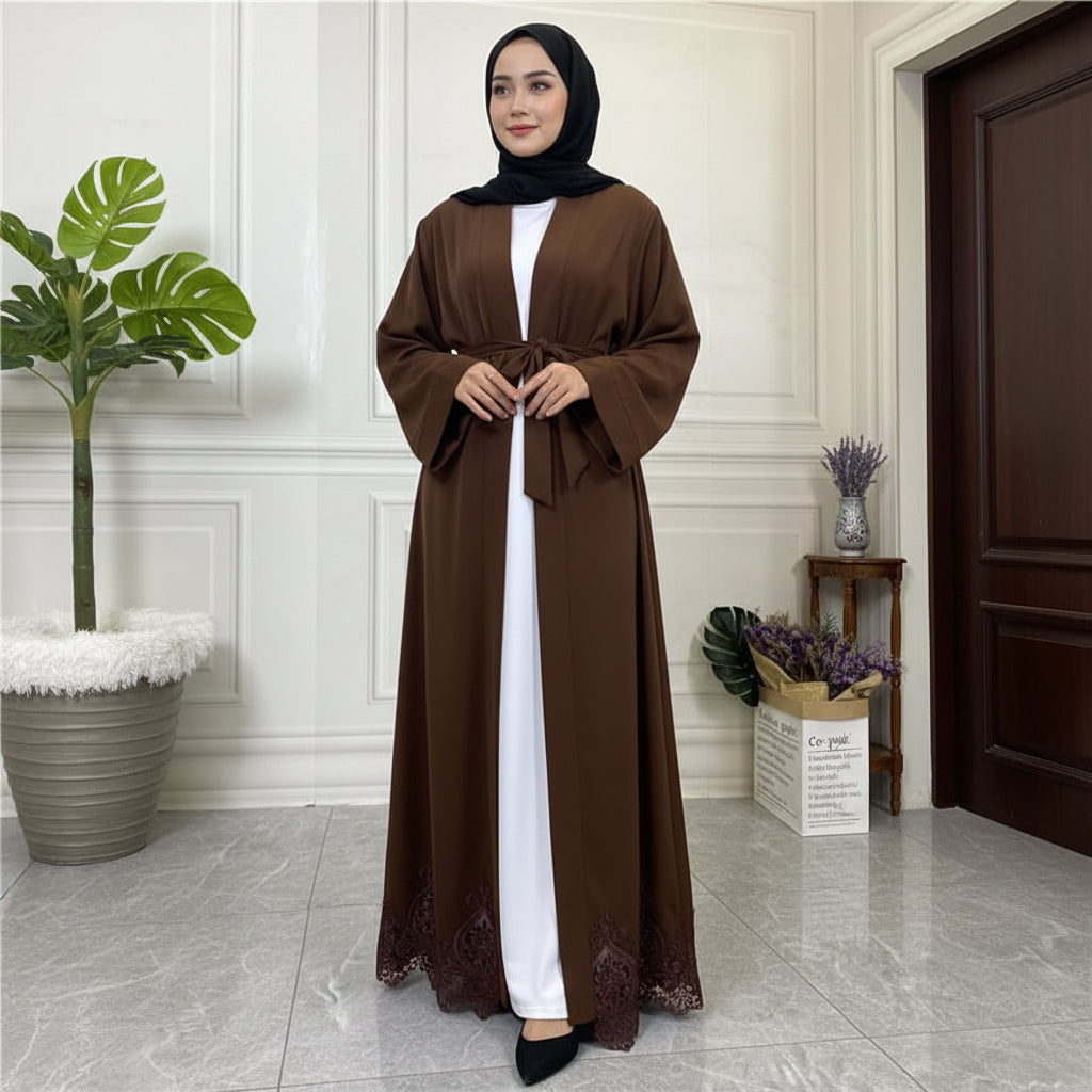Brown abaya with white inner lining on a white background