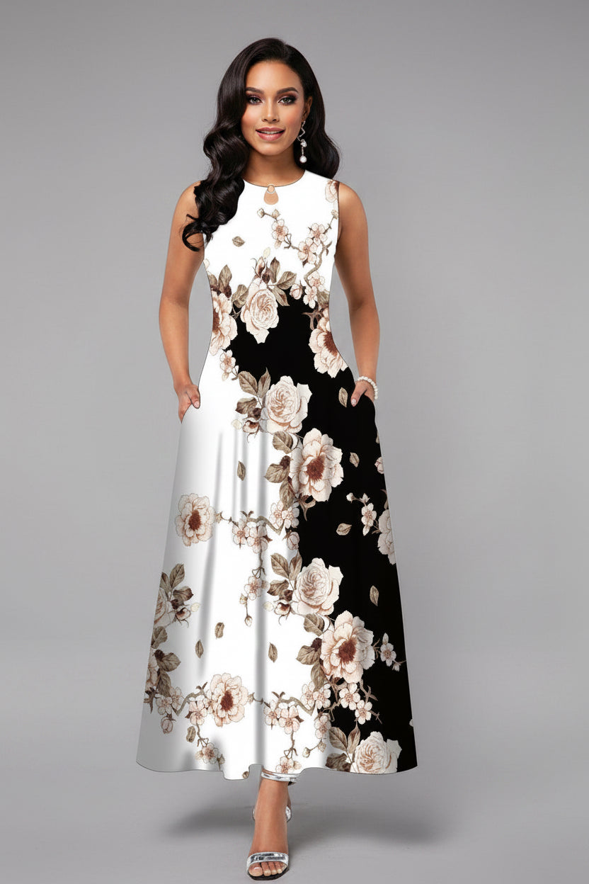 Woman wearing a floral dress with a black and white pattern on a gray background
