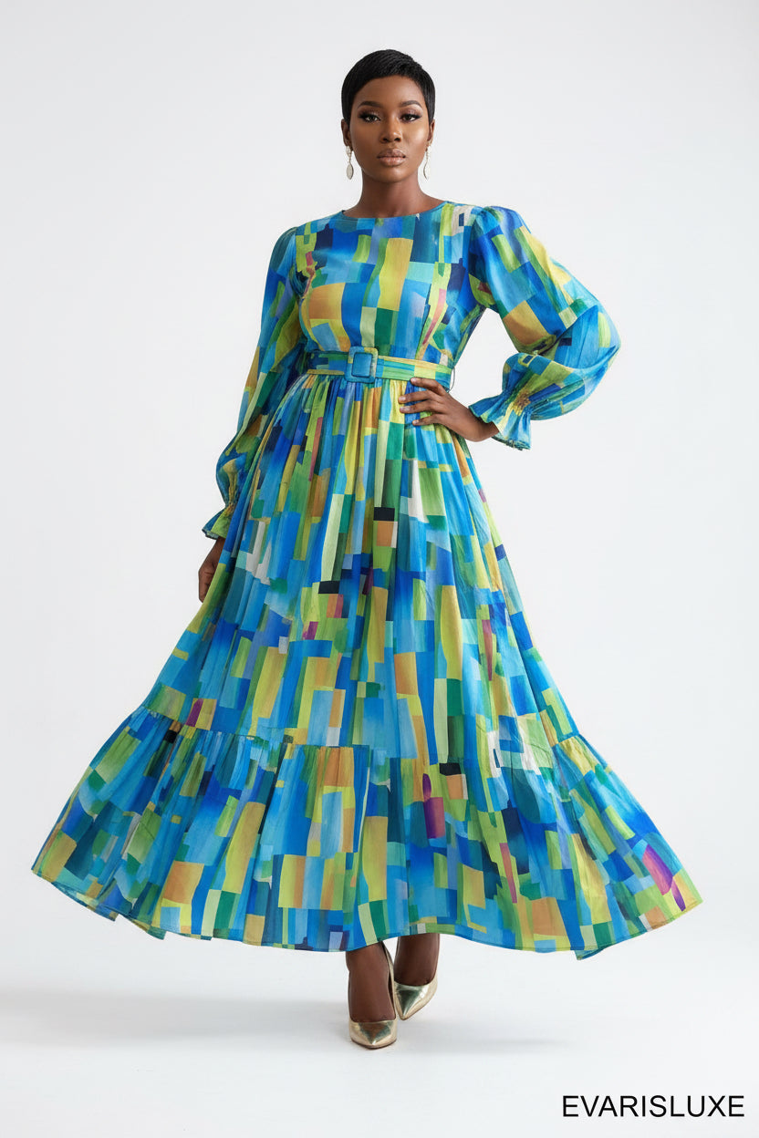 Person wearing a colorful geometric patterned dress on a white background