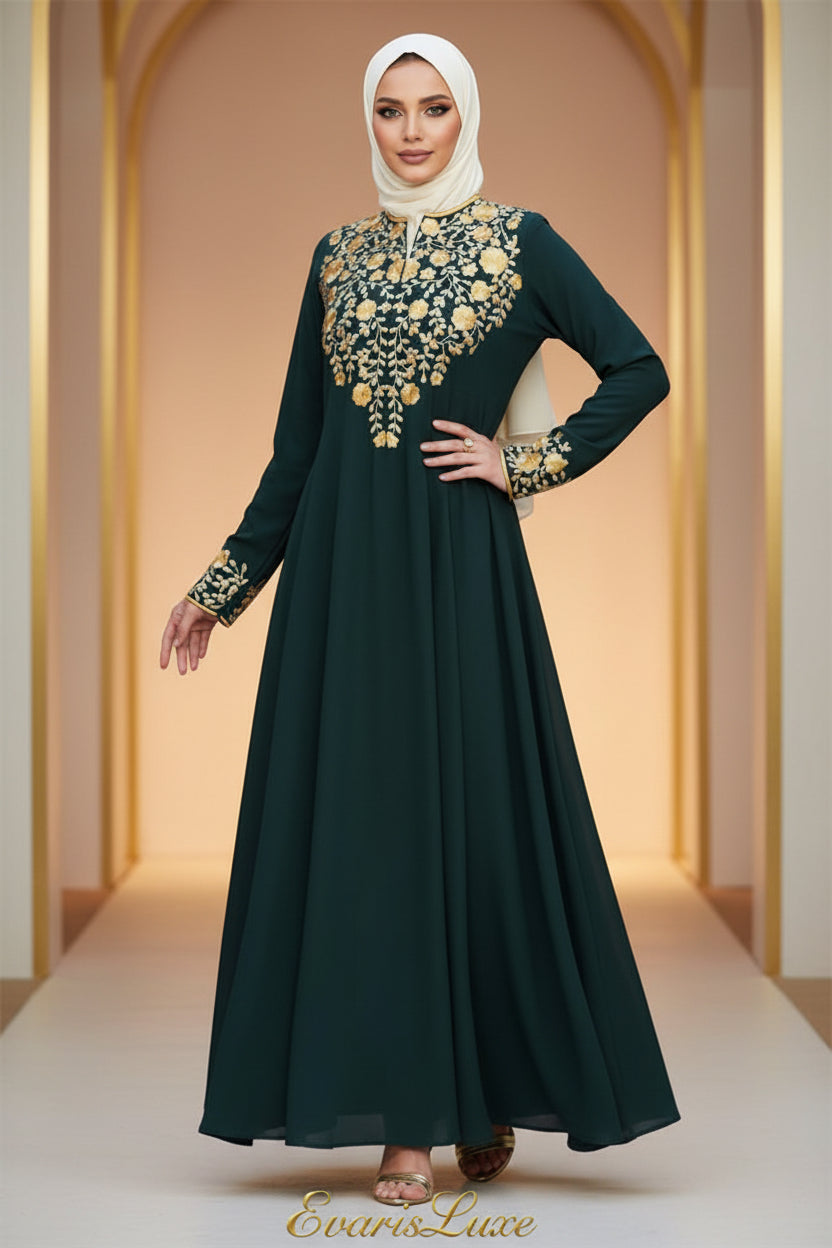 Woman wearing a dark green dress with gold embroidery in an outdoor setting.