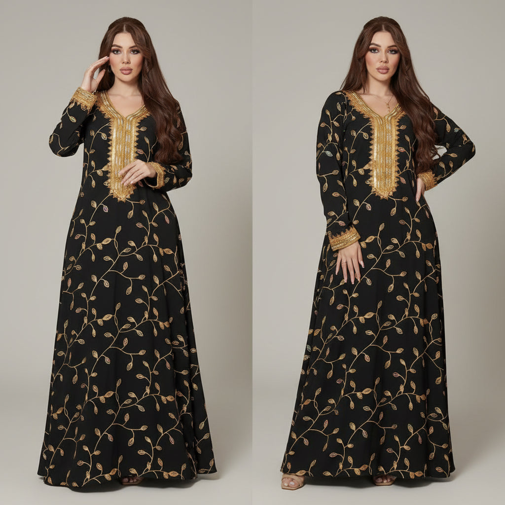 Woman wearing a black dress with gold embroidery in a decorated room.