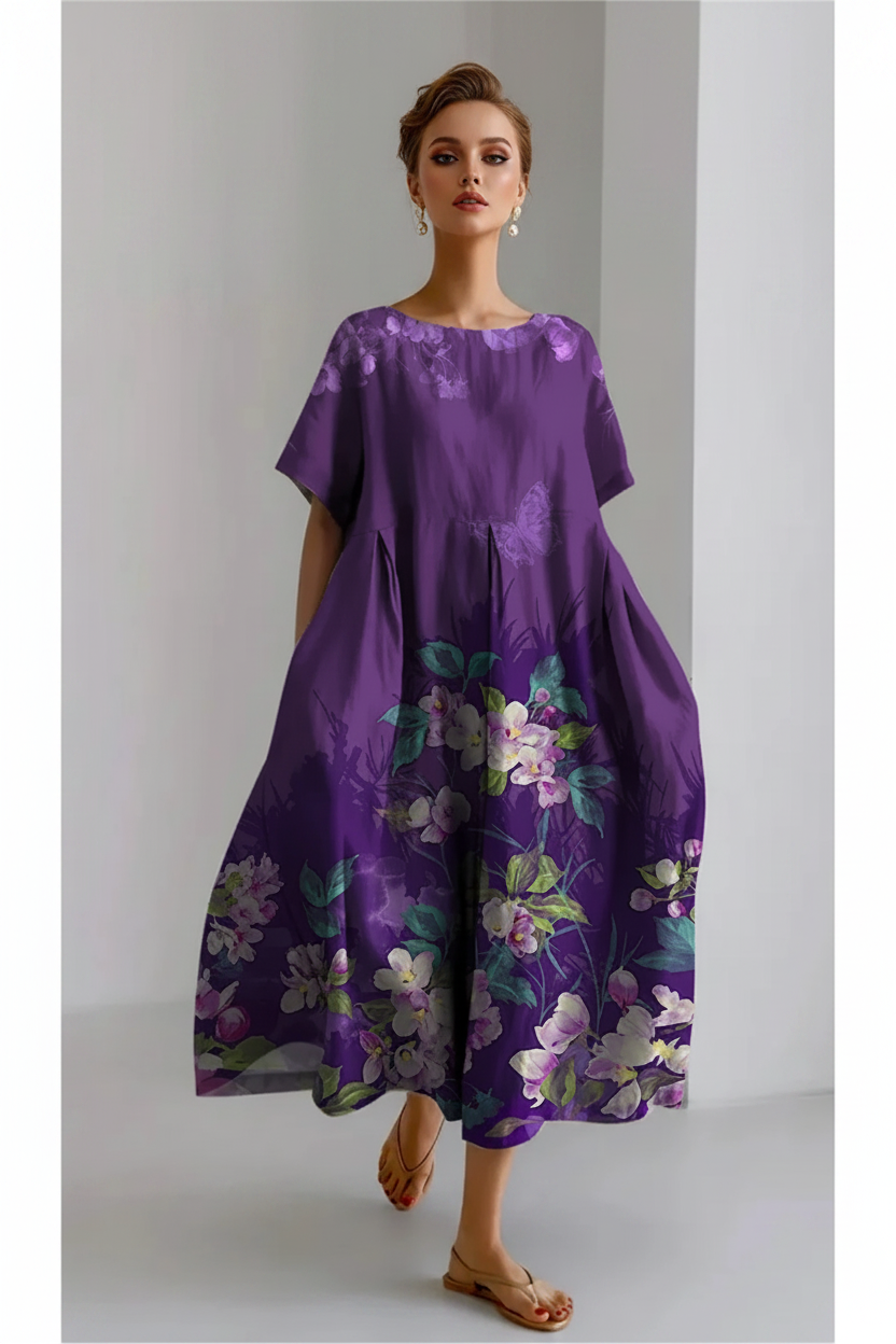 Purple floral dress on a plain background
