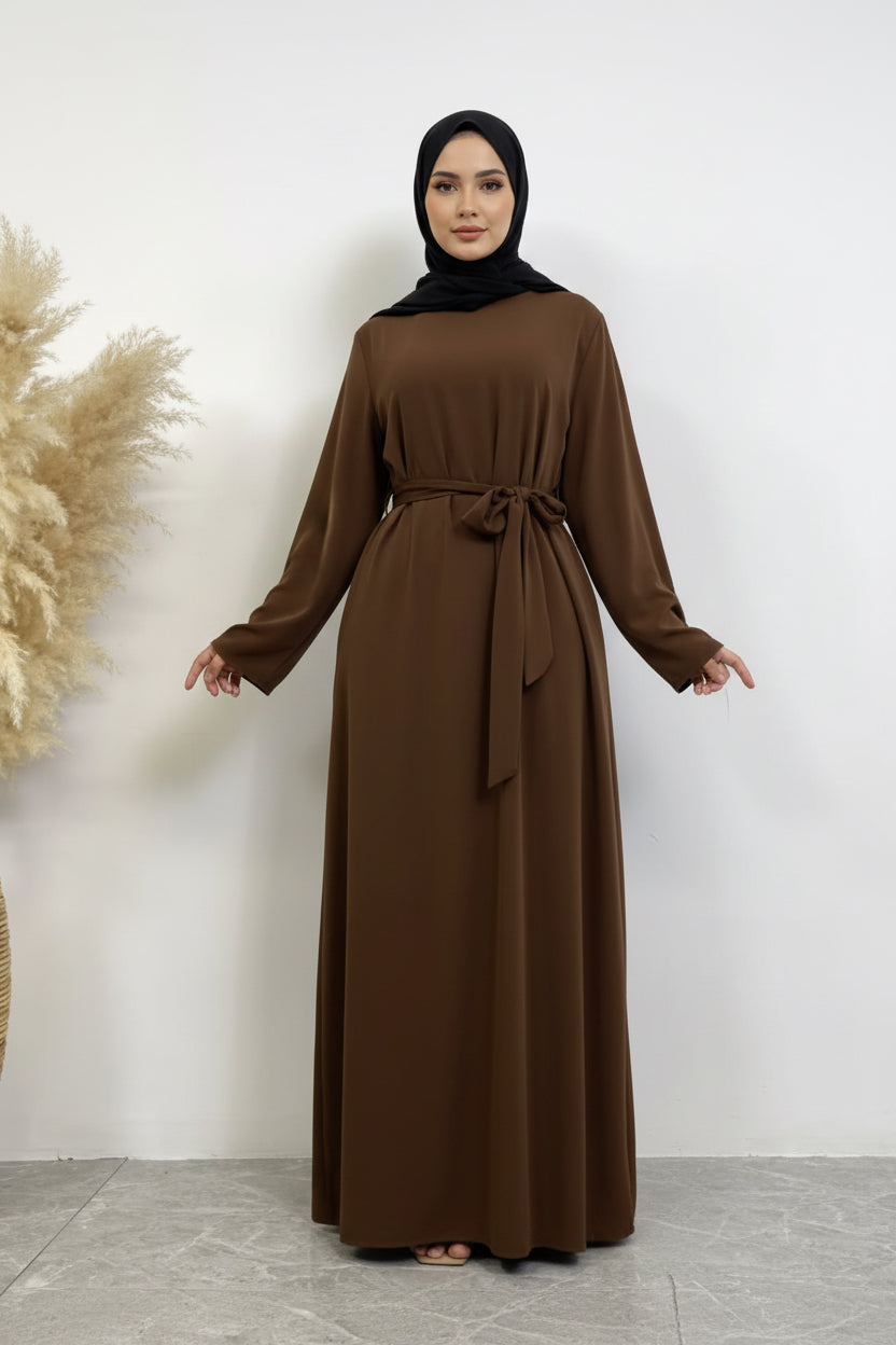 Brown long-sleeve dress with a belt on a white background
