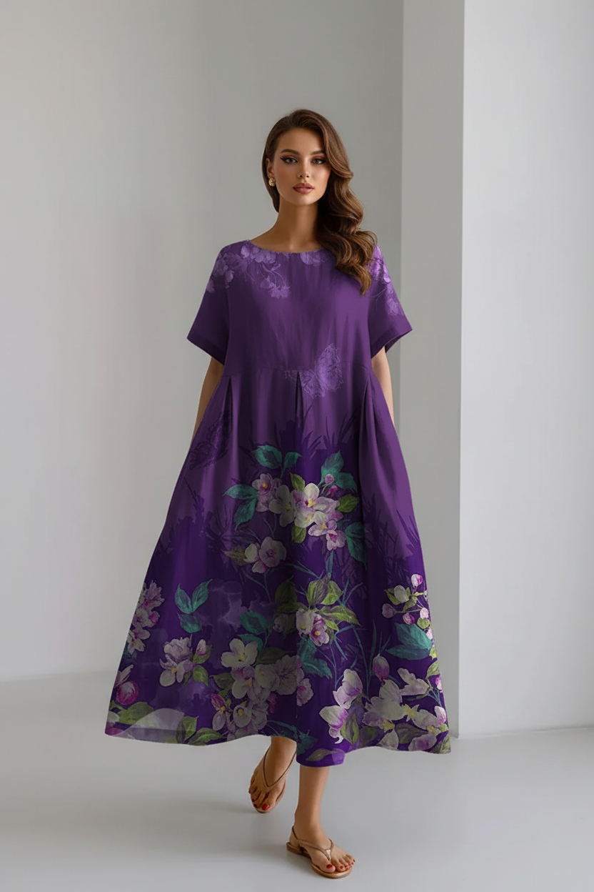 Purple floral dress on a plain background