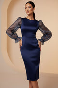 Navy blue dress with sheer long sleeves on a white background