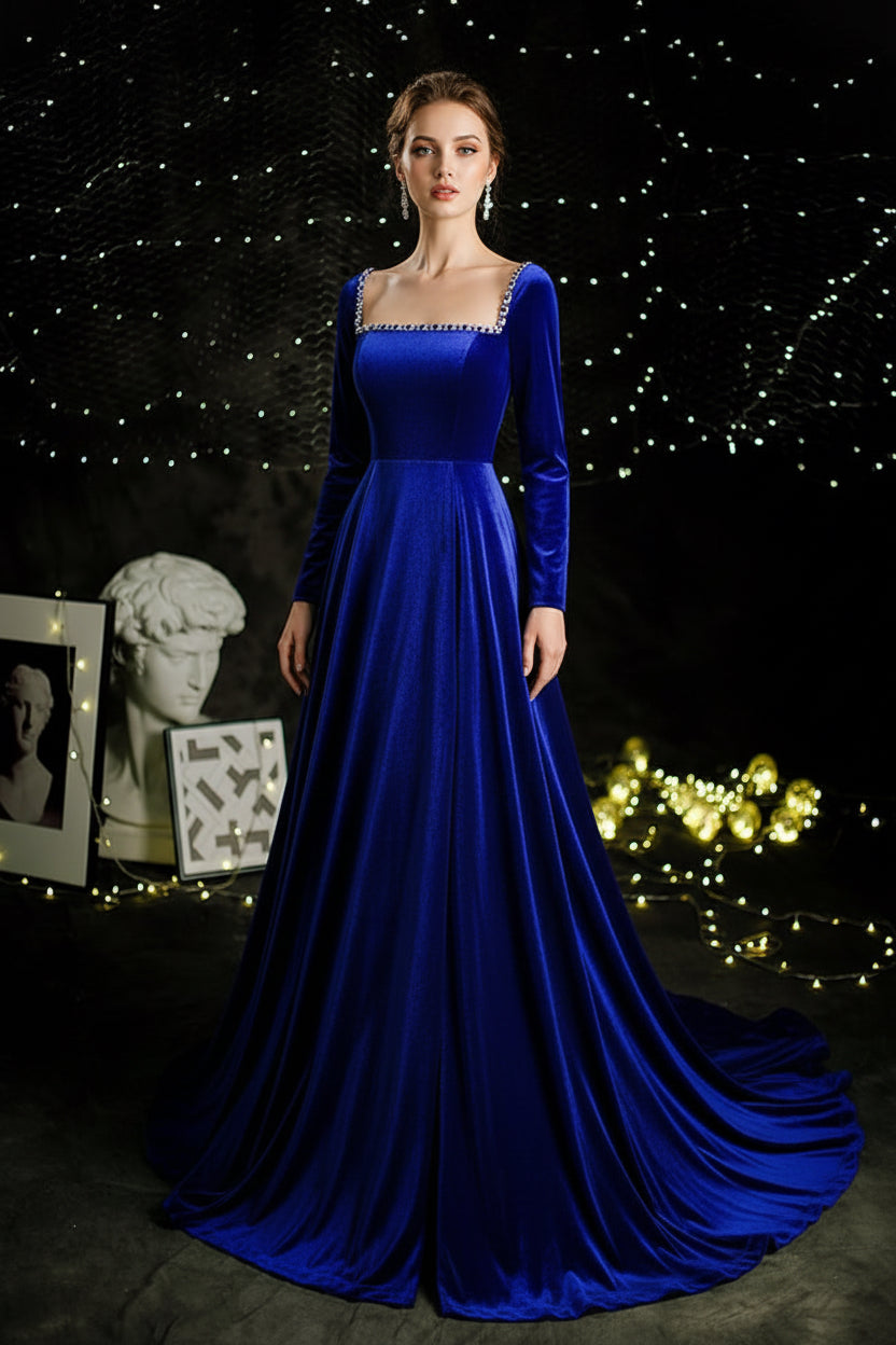 Blue evening gown on a mannequin against a dark background with decorative elements.