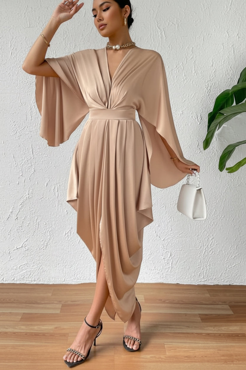 Woman wearing a beige dress with a white background